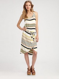 Decorated by contrasting stripes, this jersey scoopneck has an asymmetrical hi-low hem and waist-enhancing self tie. ScoopneckSleevelessSelf tie at drop waistAsymmetrical hi-low hemAbout 27 from natural waist96% rayon/4% spandexDry cleanMade in USAModel shown is 5'10 (177cm) wearing US size Small. Decorated by contrasting stripes, this jersey scoopneck has an asymmetrical hi-low hem and waist-enhancing self tie. ScoopneckSleevelessSelf tie at drop waistAsymmetrical hi-low hemAbout 27 from natural waist96% rayon/4% spandexDry cleanMade in USAModel shown is 5'10 (177cm) wearing US size Small.