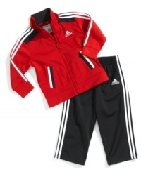Sporty style starts early when he's wearing this comfortable tricot jacket and pant set from adidas. Sporty style starts early when he's wearing this comfortable tricot jacket and pant set from adidas.
