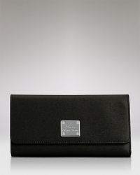 Crafted in rich textured leather, Lauren Ralph Lauren's classic wallet features a slim, sophisticated continental silhouette to effortlessly store belongings. Crafted in rich textured leather, Lauren Ralph Lauren's classic wallet features a slim, sophisticated continental silhouette to effortlessly store belongings.