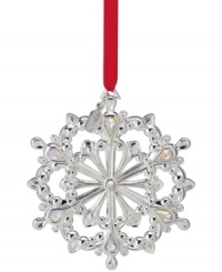 Dream of a silver Christmas. Crafted in lustrous silver plate, the 2012 Snow Majesty snowflake ornament features twinkling crystal gems and a dated tag to commemorate this year's celebration. Dream of a silver Christmas. Crafted in lustrous silver plate, the 2012 Snow Majesty snowflake ornament features twinkling crystal gems and a dated tag to commemorate this year's celebration.