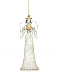 An aura of love pours out of this ornate angel ornament from Lenox. With exquisite detail and sparkling accents, this angel stands tall as she holds a striking gold heart. With gold hanging thread. An aura of love pours out of this ornate angel ornament from Lenox. With exquisite detail and sparkling accents, this angel stands tall as she holds a striking gold heart. With gold hanging thread.