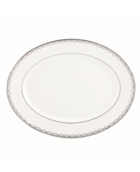 Sturdy bone china draped in a delicate platinum garland makes the Iced Pirouette platter by Lenox a flawless go-to for formal entrees. Sturdy bone china draped in a delicate platinum garland makes the Iced Pirouette platter by Lenox a flawless go-to for formal entrees.