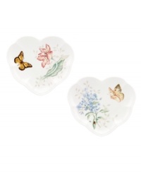 The whimsical butterflies and blooms of Butterfly Meadow dinnerware grace these darling heart-shaped party plates, an irresistible way to serve hors devours and dessert. The whimsical butterflies and blooms of Butterfly Meadow dinnerware grace these darling heart-shaped party plates, an irresistible way to serve hors devours and dessert.