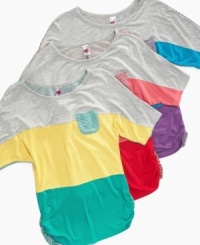 She can lock down her sweet looks with one of these colorblock tees from Beautees, a cute retro style. She can lock down her sweet looks with one of these colorblock tees from Beautees, a cute retro style.