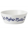 Ringed with navy flora, the Fable Garland cereal bowl boasts distinct Scandinavian style and, in Royal Doulton porcelain, is up for just about any task. Mix with other Karolin Schnoor nature patterns to customize your table.