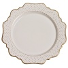 Defined by graceful silhouettes and subtle polka-dot details in hand-painted gold, this porcelain whiteware from Anna Weatherly adds a charming element to the table. Pair with more lavish pieces from Anna's assortment, or more simple accessories for an understated elegance.