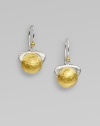 This eye-catching design features a textured drop with radiant 24k gold on one side and sleek sterling silver on the other side for a modern style. 24k goldSterling silverLength, about 1Hook backImported 