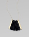 Black-finished strips hang together in a tapered fan shape, creating drama in this stunning pendant on a delicate chain.Black finishingGoldtone, brass and goldplatingLength, about 27½Slip-on stylingMade in USA