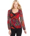 A paisley print adds a luxuriously colorful element to this Sunny Leigh top.