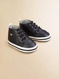 A soft, classic high-top design with lace closure and logo detail.Lace-upPolyurethane upperCotton liningPadded insole75% polyurethane/25% rubber soleImported A soft, classic high-top design with lace closure and logo detail.Lace-upPolyurethane upperCotton liningPadded insole75% polyurethane/25% rubber soleImported