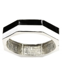 Earn your stripes with this trendy style. Nine West's chic colorblock bangle is perfect for stacking with its black and white enamel design and silver tone mixed metal setting. Bracelet stretches to fit wrist. Approximate diameter: 2-1/2 inches. Earn your stripes with this trendy style. Nine West's chic colorblock bangle is perfect for stacking with its black and white enamel design and silver tone mixed metal setting. Bracelet stretches to fit wrist. Approximate diameter: 2-1/2 inches.