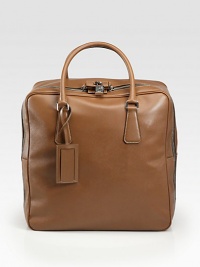 An elegant travel accessory is crafted in textured saffiano leather with top handles and a removable ID tag. Zip closureTop handlesID tagInterior zip pocketFully lined 16W X 12H X 7½WMade in Italy DUE TO HIGH DEMAND, A CUSTOMER MAY ORDER NO MORE THAN 3 UNITS OF THIS ITEM EVERY THIRTY DAYS. An elegant travel accessory is crafted in textured saffiano leather with top handles and a removable ID tag. Zip closureTop handlesID tagInterior zip pocketFully lined 16W X 12H X 7½WMade in Italy DUE TO HIGH DEMAND, A CUSTOMER MAY ORDER NO MORE THAN 3 UNITS OF THIS ITEM EVERY THIRTY DAYS.