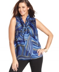 A bold color and unique print up the ante on a plus size blouse from Kasper. Wear the bow tied for extra feminine flair. A bold color and unique print up the ante on a plus size blouse from Kasper. Wear the bow tied for extra feminine flair.