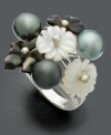 The treasures of both land and sea. This gorgeous sterling silver ring features flowers crafted from mother-of-pearl and iridescent black Tahitian pearls (7-8 mm). Size 7.