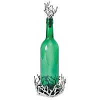 Cork the wine in advance and serve it in this distinctive set. The bottle rests on a coaster hidden within a coral cluster, and the stopper is topped with more coral branches. Cork the wine in advance and serve it in this distinctive set. The bottle rests on a coaster hidden within a coral cluster, and the stopper is topped with more coral branches.