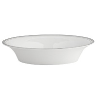 World-renowned fashion designer Monique Lhuillier collaborated with Waterford to create this fine bone china dinnerware collection. Drawing inspiration from the artful details that finish Lhuillier's brilliant couture bridal gowns, each piece in the assortment is decorated with polished platinum accents in a raised stitching design. World-renowned fashion designer Monique Lhuillier collaborated with Waterford to create this fine bone china dinnerware collection. Drawing inspiration from the artful details that finish Lhuillier's brilliant couture bridal gowns, each piece in the assortment is decorated with polished platinum accents in a raised stitching design.