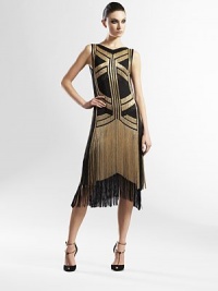 Graphic, hand-finished chain embroidery and fringe trim on silk georgette.V necklineSleevelessHand chain embroideryChain skirt with fringe trimSilkDry cleanMade in ItalyModel shown is 5'11 (180cm) wearing US size 4. Graphic, hand-finished chain embroidery and fringe trim on silk georgette.V necklineSleevelessHand chain embroideryChain skirt with fringe trimSilkDry cleanMade in ItalyModel shown is 5'11 (180cm) wearing US size 4.