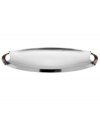 Polished aluminum alone makes Rivet serveware a standout, but with contrasting bronze handles and a sleek yet generously proportioned silhouette, this Dansk oval server embodies modern sophistication. (Clearance)