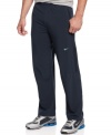 Keep your cool even when you're working out with these Nike running pants featuring zippered legs and Dri-Fit technology.