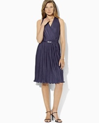 A dramatic V-neckline imparts feminine allure to a silky jersey dress with polished pleats, creating an unparalleled evening staple. A dramatic V-neckline imparts feminine allure to a silky jersey dress with polished pleats, creating an unparalleled evening staple.