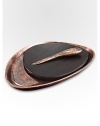 A smooth, rounded pebble shape with the distinctive beauty of bronze-finish alloy and wood creates the ultimate hostess or wedding gift. From the Heritage Pebble CollectionIncludes cheese knifeAntique copper-plated alloy15W x 11LHand washImported