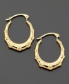 Dress up with peaceful bamboo. You'll love the design of these 14k gold hoop earrings. Approximate diameter: 1/2 inch.