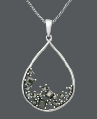 Like sand in an hourglass, this exquisite Genevieve & Grace pendant features a scattered array of marcasite in a smooth, sterling silver setting. Approximate length: 18 inches. Approximate drop: 1-3/8 inches. Like sand in an hourglass, this exquisite Genevieve & Grace pendant features a scattered array of marcasite in a smooth, sterling silver setting. Approximate length: 18 inches. Approximate drop: 1-3/8 inches.