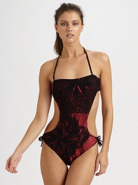Boldly designed with cutout sides and lingerie-inspired lace details for a beyond-seductive look.Removable halter strapBikini back tieFully lined90% polyamide/10% elastaneHand washMade in Italy Boldly designed with cutout sides and lingerie-inspired lace details for a beyond-seductive look.Removable halter strapBikini back tieFully lined90% polyamide/10% elastaneHand washMade in Italy