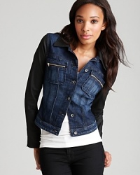 GUESS puts a fresh, new spin on the classic denim jacket with a contrast collar and sleeves, adding a modern edge to the design. GUESS puts a fresh, new spin on the classic denim jacket with a contrast collar and sleeves, adding a modern edge to the design.