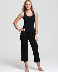 The scalloped lace trim on the tank and cropped length of the pants give this basic OnGossamer set a fresh, updated feel. The scalloped lace trim on the tank and cropped length of the pants give this basic OnGossamer set a fresh, updated feel.