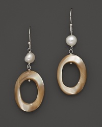 A shimmering mix of mother-of-pearl and cultured freshwater pearls. A shimmering mix of mother-of-pearl and cultured freshwater pearls.