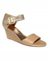 Jet-setter chic. Slip on the Packurbags wedge sandal by Nine West and head out for summertime adventure.