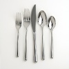 This set includes four each of: dinner fork, dinner spoon, salad fork, teaspoon and dinner knife.