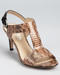 Timelessly classic, these KORS Michael Kors sandals seamlessly transition from the office to after hours. A contrast ankle strap adds a modern touch. Timelessly classic, these KORS Michael Kors sandals seamlessly transition from the office to after hours. A contrast ankle strap adds a modern touch.