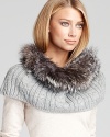 Trimmed in plush fox fur, Surell's cable knit loop lends undeniable glamour to nights on the town.