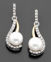 Diamonds & pearls that are always in style. Get into glam with these gorgeous earrings featuring cultured freshwater pearls (6 mm) & round-cut diamond accents. Set in 14k gold & sterling silver. Approximate drop: 3/4 inches.