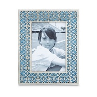 Sandcast by hand and hand-painted with a specially colored enamel that's mixed with crushed mother of pearl, this frame from Julia Knight adds a luxe touch to any decor. Sandcast by hand and hand-painted with a specially colored enamel that's mixed with crushed mother of pearl, this frame from Julia Knight adds a luxe touch to any decor.