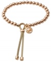 Aren't you chic? Stay in the loop with updated styles by Michael Kors. This beaded bracelet features polished beads and an adjustable leather closure. Beads and logo charm crafted from rose gold tone mixed metal. Bracelet stretches to fit wrist. Approximate diameter: 2-1/2 inches.