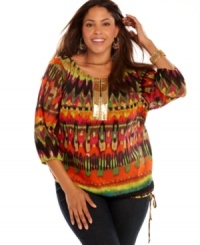 Embrace samba style with Calvin Klein's three-quarter sleeve plus size peasant top, flaunting a Brasil-inspired print! Embrace samba style with Calvin Klein's three-quarter sleeve plus size peasant top, flaunting a Brasil-inspired print!