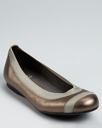 In shimmering metallic leather, these flexible ballet flats offer easily-stowable comfort and style. In shimmering metallic leather, these flexible ballet flats offer easily-stowable comfort and style.