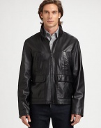 Neatly patterned perforations details and defines this zip-front jacket, tailored from lustrous lambskin leather that exudes modern cool.Two-way zip frontStand collarChest welt, waist flap pocketsFully linedAbout 19 from shoulder to hemLeatherDry cleanImported