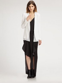 The perfect balance of masculine and feminine appeal, a strong piece that offers timeless style.Modern notched collarLong sleevesConcealed button closureExposed liningFront pocketsBack seam and ventAbout 28 from shoulder to hemViscoseDry cleanMade in USA of Italian fabric Model shown is 5'10 (177cm) wearing US size 4. The perfect balance of masculine and feminine appeal, a strong piece that offers timeless style.Modern notched collarLong sleevesConcealed button closureExposed liningFront pocketsBack seam and ventAbout 28 from shoulder to hemViscoseDry cleanMade in USA of Italian fabric Model shown is 5'10 (177cm) wearing US size 4.