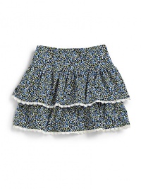 THE LOOKElasticized waistTiered ruffled skirtInterior shortsTHE MATERIAL95% cotton/5% spandexCARE & ORIGINMachine washImported THE LOOKElasticized waistTiered ruffled skirtInterior shortsTHE MATERIAL95% cotton/5% spandexCARE & ORIGINMachine washImported