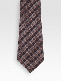 A sartorial standard woven in Italian silk.About 2.8 wideSilkDry cleanMade in Italy