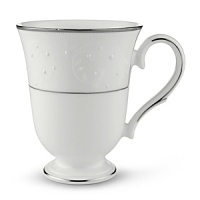 With enameled pearl-like dots, an opalescent background, and the innocence of bone china, Opal Innocence is a romantic pattern of understated elegance. Two bands of platinum a slightly wider one on the rim, kissing a thin fluted design, and a narrower one inside the border adorn each plate. The cup bears additional platinum on its graceful handle and another band at midpoint. Each piece is decorated with a flowing, white-on-white vine design peppered with enamel dots. This service creates a splendid formal table setting and, because of its neutral coloring, works well with any table décor. With enameled pearl-like dots, an opalescent background, and the innocence of bone china, Opal Innocence is a romantic pattern of understated elegance. Two bands of platinum a slightly wider one on the rim, kissing a thin fluted design, and a narrower one inside the border adorn each plate. The cup bears additional platinum on its graceful handle and another band at midpoint. Each piece is decorated with a flowing, white-on-white vine design peppered with enamel dots. This service creates a splendid formal table setting and, because of its neutral coloring, works well with any table décor.