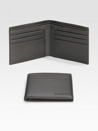 A classic leather bi-fold wallet with cut-out logo detail. Two bill compartments Six card slots 4.3W X 3.5H Made in Italy 