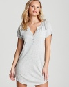 A comfy and casual henley sleepshirt with partial button placket and rounded hem.