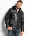 On the edge. Add some rebelliousness to your everyday style with this leather motorcycle jacket from Guess.