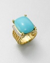From the Wheaton Collection. A stunning turquoise cabochon is flanked by dazzling diamonds set in radiant 18k gold. TurquoiseDiamonds, .27 tcw18k goldWidth, about .78Imported