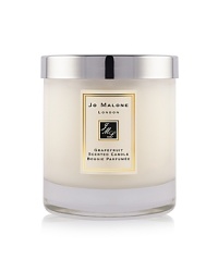 Instantly awakening the senses, Grapefruit is a lively, uplifting citrus with a spicy heart. Grapefruit and tangerine are combined with vetiver and rosemary to create this outspoken citrus scent. The Grapefruit Home Candle infuses any room with evocative scent and lasts for hours. An everyday luxury, it brings warmth to any environment. 200g. Instantly awakening the senses, Grapefruit is a lively, uplifting citrus with a spicy heart. Grapefruit and tangerine are combined with vetiver and rosemary to create this outspoken citrus scent. The Grapefruit Home Candle infuses any room with evocative scent and lasts for hours. An everyday luxury, it brings warmth to any environment. 200g.